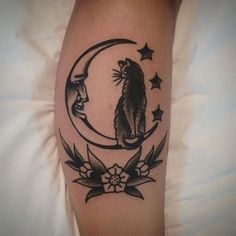 a cat sitting on the moon with stars and crescent around it, tattoo style design