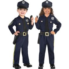 two children dressed in police uniforms, one is holding a bottle and the other has a cell phone