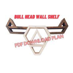 a wooden headband with an arrow on it and the words bull head wall shelf