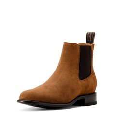 Handcrafted in León, Mexico, the Reed boot blends classic Western style with the iconic Chelsea silhouette. Made with soft, premium Italian calf leather, it's comfortable straight out of the box and fits seamlessly under slimmer jeans and pants. Bench Made Reed Western Boot | Product Features : 0 : Removable All Day Cushioning insole with genuine vegetable tanned, anti-odor leather sock liner that molds to your foot, 1 : Cork filled forefoot for added comfort and cushioning, 2 : Resolable 9-iron Western Leather Chelsea Boots With Goodyear Welt, Goodyear Welted Leather Western Chelsea Boots, Classic Calf Leather Moto Boots For Work, Classic Workwear Moto Boots In Calf Leather, Suede Snip Toe Boots For Work, Western Style Calf Leather Business Boots, Classic Calf Leather Boots With Snip Toe, Western Calf Leather Boots For Workwear, Western Calf Leather Boots For Business