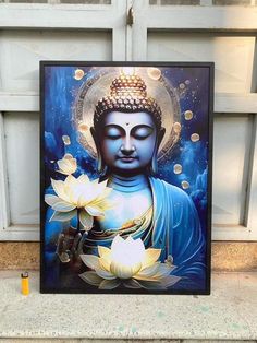 a buddha statue sitting on top of a cement slab