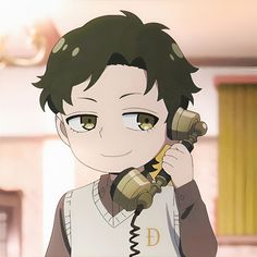 an anime character is talking on the phone and holding something in his hand while wearing a sweater