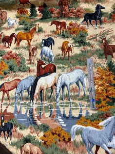 the horses are grazing on the grass by the water's edge in this tapestry