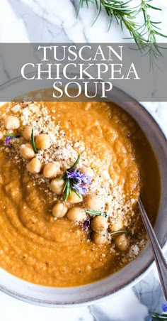 a bowl of tuscann chickpea soup with sprinkled parmesan cheese on top