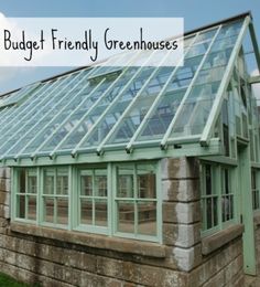 a green house with the words budget friendly greenhouses on it's front window