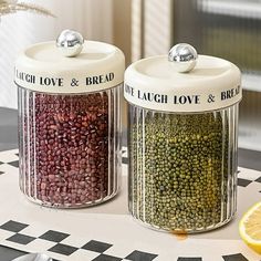 two jars filled with different types of beans