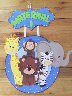 there is a sign with animals and giraffes on it that says maternal