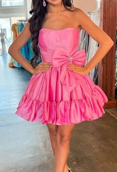 Fit And Flare Mini Dress For Prom Season, Fit And Flare Mini Dress For Prom, Knee-length Ruffled Fit And Flare Mini Dress, Strapless Ruffled Mini Dress For Homecoming, A-line Mini Dress With Bow For Prom, Strapless Mini Dress With Ruffles For Homecoming, Strapless Ruffled Mini Dress For Prom, Strapless Ruffle Mini Dress For Prom Season, Pink A-line Mini Dress With Bow