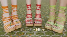 three pairs of shoes with different colored straps and bows on the toes are standing next to each other