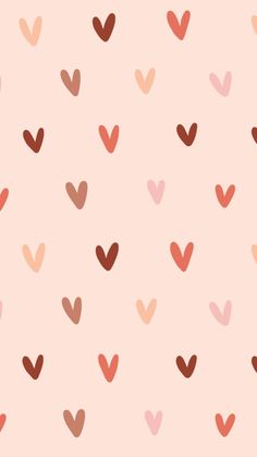 a pink and brown heart pattern with small hearts on the back ground, all in different colors