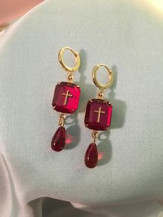 "Red CROSS Earrings, Red Vintage glass stone, 16K Gold Loops, Reproduction historic Ruby Red Cross earrings Measurements: Earrings measure about 1 7/8\" long Red vintage glass stones with cross measure 10 X 8 This listing is for a pair beautiful, ruby red vintage glass CROSS stones set in brass setting, with vintage red glass tiny teardrops or vintage pearl teardrops (your choice), and mounted on 16K gold plate brass, period appropriate loops. I love the beautiful glinting ruby red, gold cross d Vintage Red Teardrop Jewelry, Handmade Red Ruby Earrings, Victorian Red Earrings As Gift, Red Victorian Earrings As Gift, Red Spiritual Jewelry, Vintage Red Single Earring, Antique Red Dangle Jewelry, Antique Red Drop Earrings, Vintage Red Gemstone Earrings