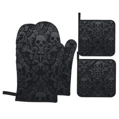 two oven mitts, one with skulls on it and the other has a skull design