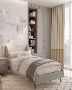 a bedroom with a bed, bookcases and curtains on the window sill