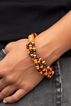 Stretchy strands of dainty brown and orange wood beads attach to a single strand of oversized brown and orange wood beads, resulting in colorful layers around the wrist.

Sold as one individual bracelet. Jewelry 2022, Hey Friend, Orange Bracelet, Orange Wood, Wooden Bracelet, Brown And Orange, Wood Bracelet, Jewelry Boutique, Paparazzi Accessories