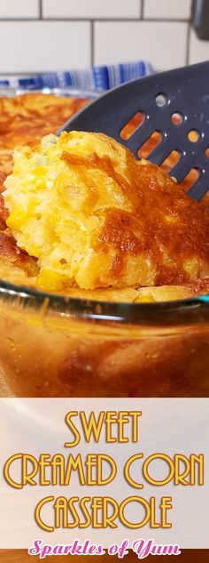 a close up of a casserole in a glass dish with a spatula