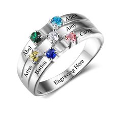 three stone family ring with names engraved on the sides and four stones in different colors