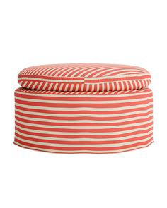 a red and white striped round ottoman