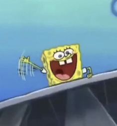 an animated spongebob with his arms out and eyes wide open in the air