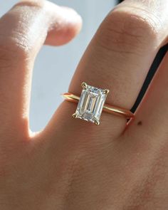 Emerald Engagement Ring, Emerald Cut Diamond Ring, Lab Grown Diamond, Emerald Cut Wedding Ring, Natural Diamond Ring, Single Diamond Ring, Promise Ring For Her, Proposal Ring, Gift This ring features an emerald solitaire diamond elegantly secured in a four-prong setting on a solid gold band for a classic and timeless look 𝐑𝐢𝐧𝐠 𝐃𝐞𝐭𝐚𝐢𝐥𝐬:  ↣ Made-To-Order. ↣ Gold: 14K / 18K Solid Gold.  ↣ Gold Color: Yellow Gold, Rose Gold, White Gold  ↣ Number of Diamonds: 1 ↣ Diamond Cut: Emerald ↣ Setting Type: Prong ↣ We offer FREE ENGRAVING service on all our jewelry.  ↣ Ring Width : 1.50 MM ↣ Ring Thickness : 1.50 MM 𝐋𝐚𝐛 𝐆𝐫𝐨𝐰𝐧 𝐃𝐢𝐚𝐦𝐨𝐧𝐝 𝐃𝐞𝐭𝐚𝐢𝐥𝐬: ↣ Lab Grown Focal Diamond: 0.10 CT, 0.25 CT, 0.50 CT, 0.75 CT, 1.00 CT, 1.50 CT, 2.00 CT, 2.50 CT, 3.00 CT. ↣ Lab Diamond Clarity Emerald Cut Wedding Ring, Knife Edge Engagement Ring, Gold Knife, Single Diamond Ring, Emerald Cut Solitaire Ring, Wedding Rings Emerald Cut, Engagement Ring Emerald Cut, Emerald Cut Diamond Ring, Emerald Cut Engagement