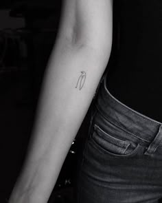 a woman's arm with a tattoo on it that has a hot dog in the middle