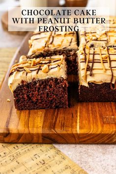 chocolate cake with peanut butter frosting on a cutting board