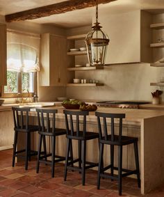 the kitchen is clean and ready to be used as a dining room or breakfast nook