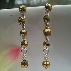 Lovely Sparkling Gold Crystal Silver Marquise Earrings Measures 1.5 Inches In Length Composed Of Wire Wrapped Faceted Gold Colored Crystals Lead And Nickel Free Silver Plated Marquise Earrings, Geometric Hoop Earrings, Sunflower Earrings, Gold Crystal, Cuff Earrings, Glass Earrings, Gold Plated Chains, Pearl Drop Earrings, Silver Pearls