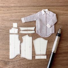 the sewing pattern is laid out and ready to be sewn into someone's shirt