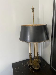 Elevate your home with this exquisite vintage Stiffel French Bouillotte brass candlestick lamp, featuring a sophisticated 3-light design and original shade. Inspired by classic French style, this lamp combines timeless elegance with high-quality craftsmanship, making it a stunning addition to any room. The brass candlestick base exudes warmth and charm, perfect for vintage or traditional decor themes. Ideal for living rooms, studies, or bedrooms, this unique lamp brings a refined touch to your space or makes a wonderful gift for vintage decor enthusiasts. Candlestick Lamp, Classic French Style, Lamp With Shade, Candlestick Lamps, Unique Lamp, Brass Candlestick, Decor Themes, Brass Candlesticks, Unique Lamps