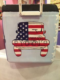 a lunch box with an american flag painted on it