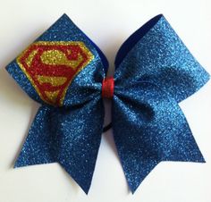 a blue bow with a superman symbol on it