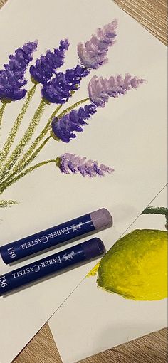 three markers and two pencils on top of a piece of paper next to some flowers