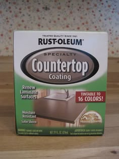 a box of countertop coating sitting on top of a wooden table