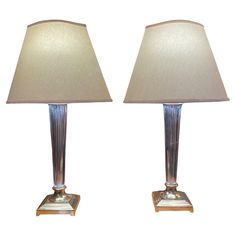 a pair of lamps sitting next to each other