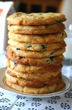 a stack of cookies sitting on top of a white plate