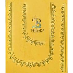 a yellow book with an ornate border on the cover