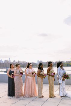 a group of women standing next to each other