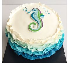 there is a cake that has a seahorse on it