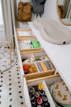 an organized drawer in a child's bedroom