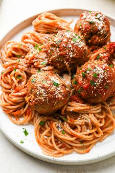 spaghetti and meatballs on a plate with the words gluten free meatballs