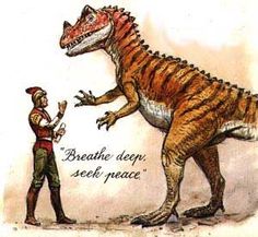 a man standing next to a dinosaur with its foot on another dinosaur's head