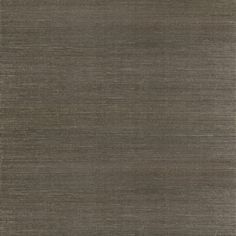 an area rug that is made up of dark brown and light gray colors with horizontal stripes