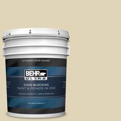 a blue paint bucket with the label behr ultra stain and primer in one