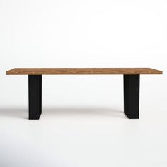 a wooden bench sitting on top of a white floor next to a black metal frame