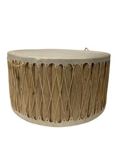 an old drum with wooden sticks in the top and bottom, on a white background