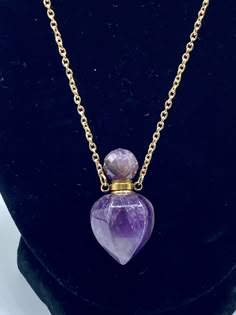 This Beautiful and Stylish Amethyst Crystal Bottle Necklace is made of raw natural Amethyst that has been beautifully carved into a Vial Necklace to hold perfume, Essential Oil, or Ashes.  This stunning & unique Amethyst Crystal Vial Necklace is a gorgeous statement piece!! This Bottle Necklace is a lovely piece to commemorate a loved one or beloved pet. Ashes can be safely & securely held in this Crystal Bottle Wear your loved one close to your heart to be reminded that they are always with you Lavender Necklace, Crystal Bottle, Streetwear Jewelry, Vial Necklace, Spiritual Necklace, Urn Necklace, Pet Ashes, Ashes Jewelry, Urn Necklaces