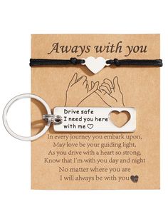 a key chain with two hands and a heart on it that says, always with you