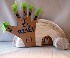 a hand made out of wood with writing on it that says, let's be risen