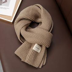 Envelop yourself in cozy warmth with this Solid Color Neckerchief Scarf, crafted from the softest cashmere and acrylic. This timeless accessory adds instant sophistication to any ensemble! DetailsPattern Type: SolidMaterial: Cashmere, AcrylicScarves Type: Scarf Winter Knit Scarf, Uni Outfits, Timeless Accessories, Womens Scarves, Shawl, Knitted Scarf, Cashmere, Solid Color, Color