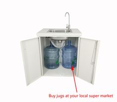 an open cabinet with two water jugs in it